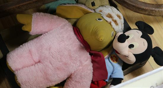 A Mickey Mouse toy and two others